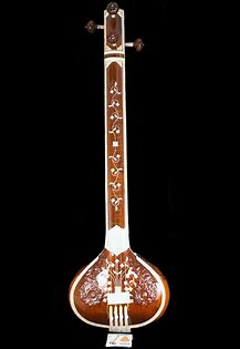 This image has an empty alt attribute; its file name is Tanpura-2-2.jpg